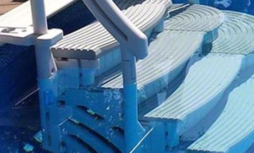 Above ground pool drop-in steps with safety railing